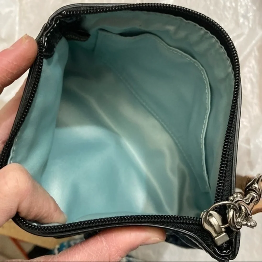 Coach embossed black patent leather op art wristlet bag